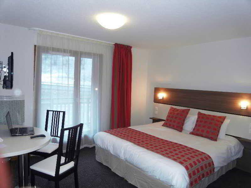 Vacanceole - Grand Massif Apart-hotel 3*